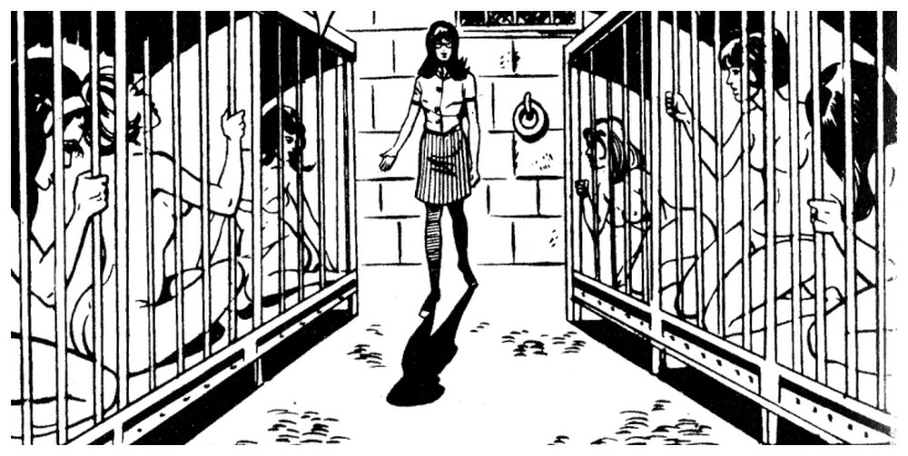 woman surveys the six women naked in her basement cages