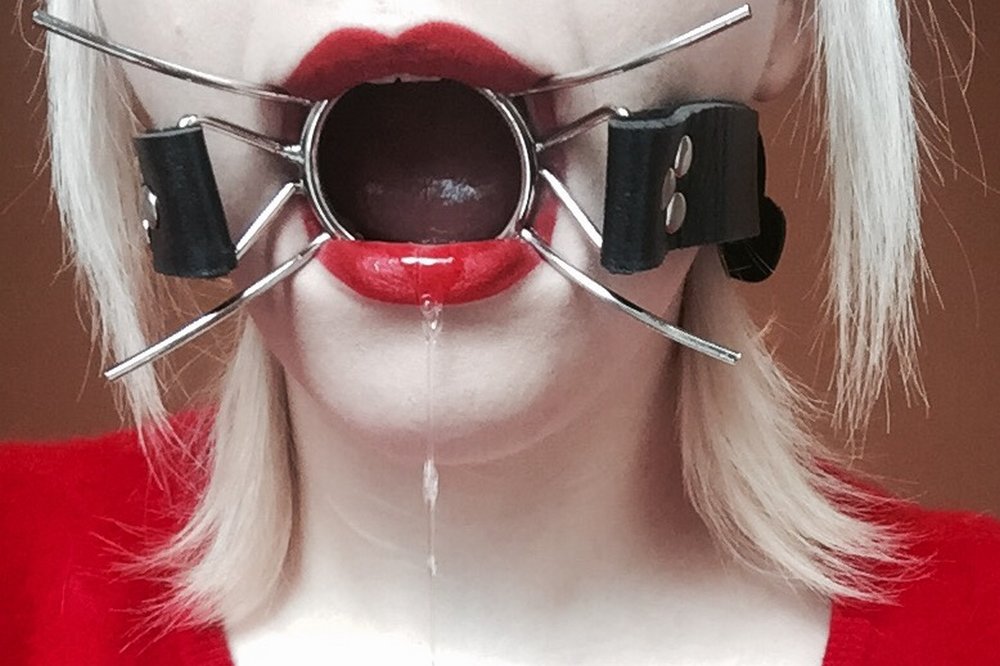 red lipstick and spider gag