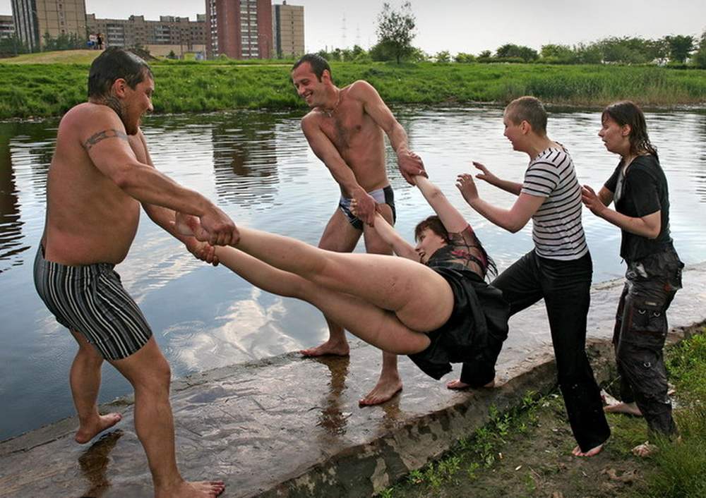 woman being thrown into the water