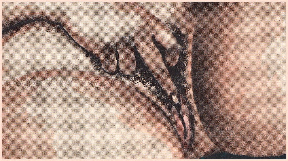 woman fingering her clitoris while masturbating