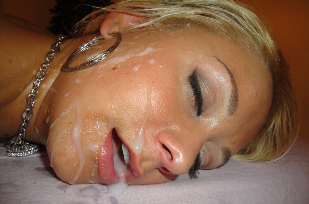 happy woman passed out with cum on her face and in her mouth after messy good sex