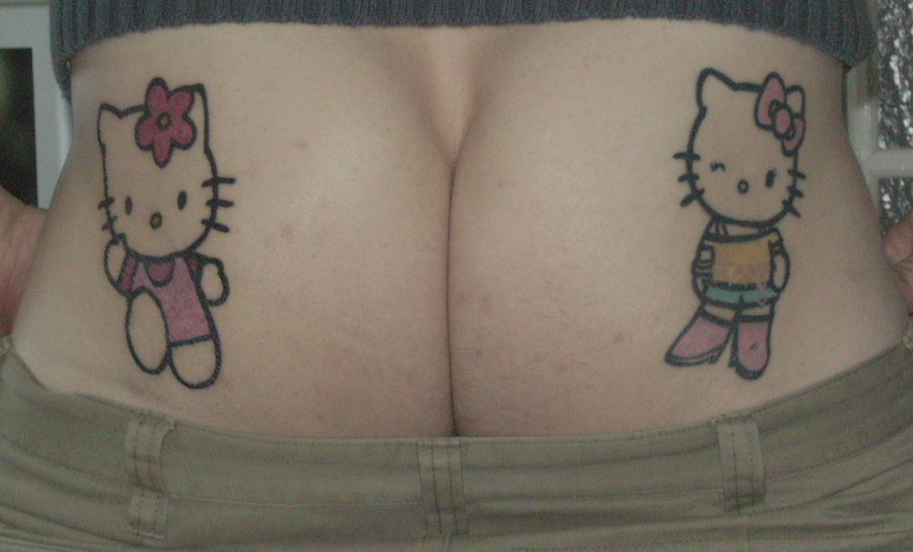 hello kitty tattoos on man-butt