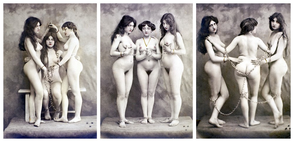 three 1905 photos of three naked women lightly chained for a studio bondage photo shoot
